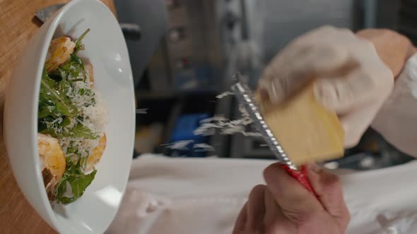 Grating Parmesan On Top Of Salad alt
