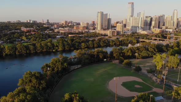 Aerial Drone shot of a Horizontal pan from a baseball field to downtown Austin, Tx. alt