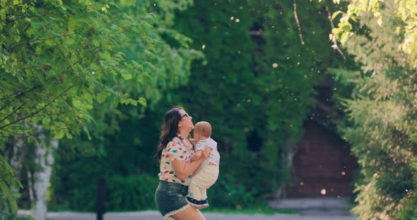 Young Mother Throws Up Baby Happy Childhood alt