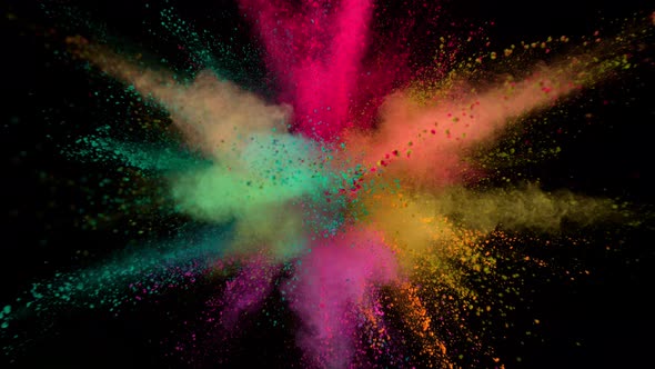 Super Slowmotion Shot of Color Powder Explosion Isolated on Black Background alt