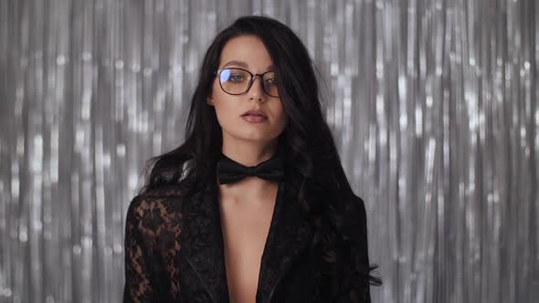 Celebrating Woman in Black Suit alt