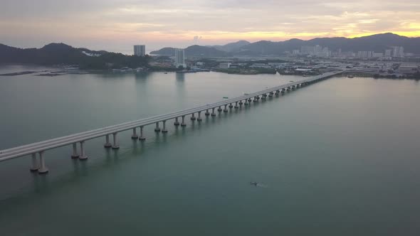 Aerial view a boat move near the Penang Second Bridge alt