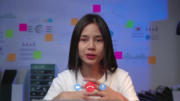 woman look to camera at video calling meeting and talking with friends online.