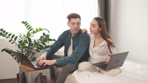 Man Work at Home, He Is in Freelance During Quarantine Coronavirus, He Use Laptop. alt