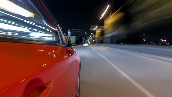Drivelapse From Side of Car Moving on a Night Avenue in City Timelapse Hyperlapse alt