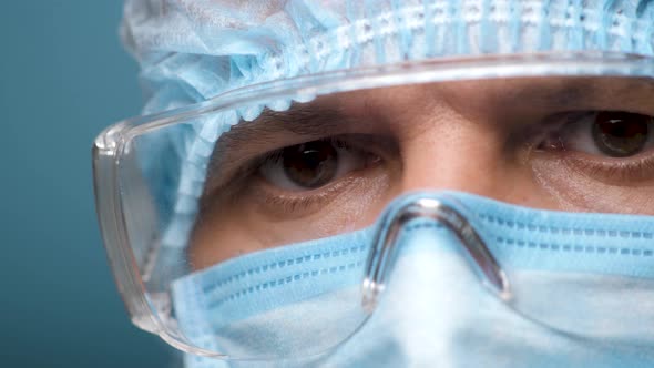 Doctor Face, Eyes in Safety Glasses. Portrait Medical Male Wearing Protection and Eyeglasses in alt