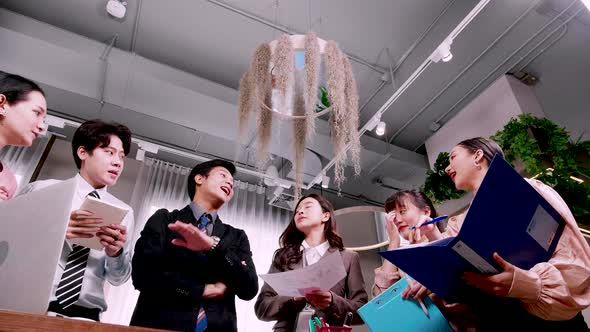 Happy diverse business people office workers team standing and meeting together. Team work alt