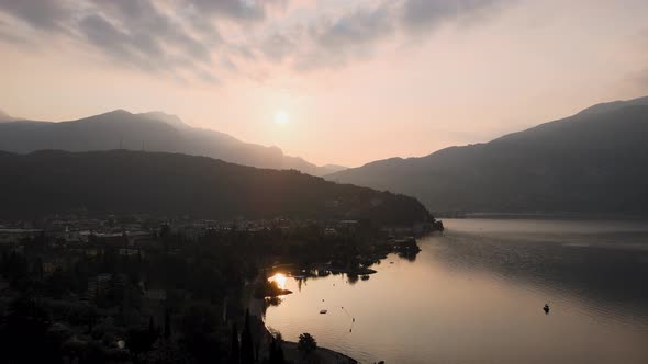 Aerial View of Magical Sunrise Above Garda Lake and Riva Del Garda City Lakeside on Summer Morning, alt