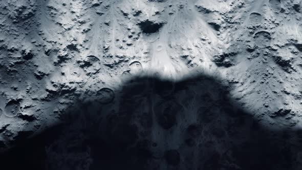 Top View of Large Shadow Passing Across the Surface of the Moon
