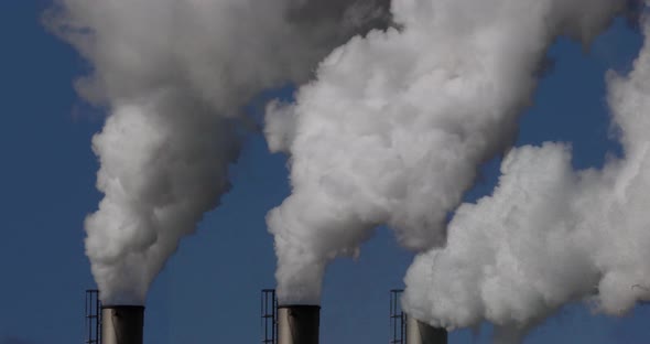 Smokestack of Sugar Refinery with Water Vapour, Near Caen in Normandy, Real Time 4K alt