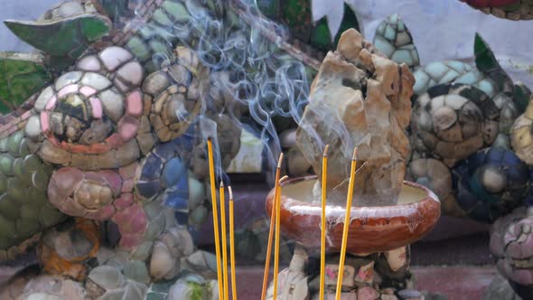 Incense burning, Hoi An, Vietnam