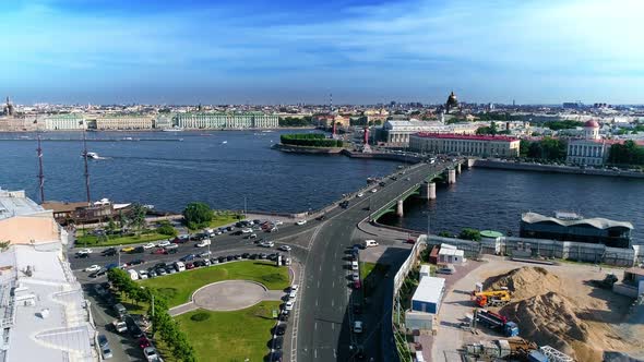 St. Petersburg. Construction site on embankment of Neva and automobile bridge alt