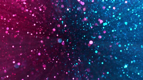 Super Slow Motion Shot of Neon Glitter Background at 1000Fps. alt