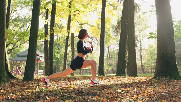 Attractive Female Having Workout Outdoors alt