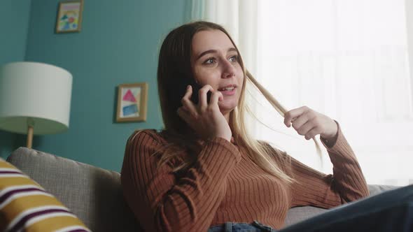 Girl Is Talking on a Cell Phone alt