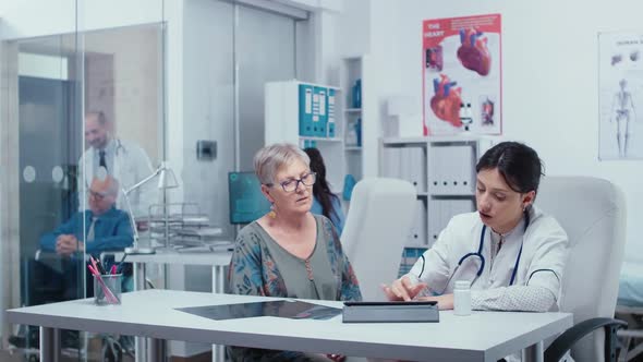 Filling Out Prescription on Tablet alt