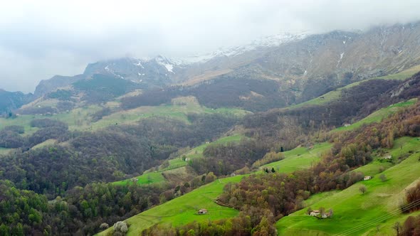 Aerial Video of the Small Town of Pasturo in Lombardy North Italy Showing Mountain Panorama Forest alt