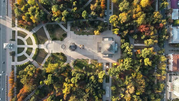 Aerial drone view of Chisinau downtown at sunset. Vertical view of central park alt