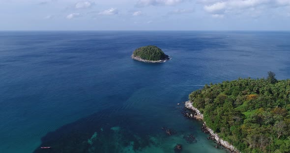 Kata beach, Phuket, Thailand. Aerial shot in the morning above Poo Island. in front of Kata beach.