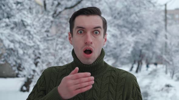 Shocked Young Male Saw Something Terrible Fearing for His Life Outdoor at Wintertime alt