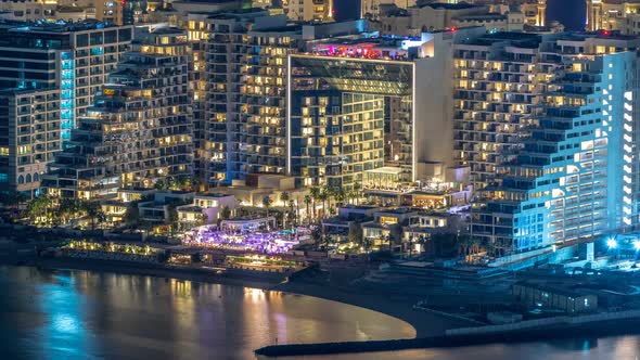 Aerial View of Palm Jumeirah Island Night Timelapse alt