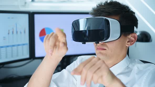 Businessman With VR Headset Working