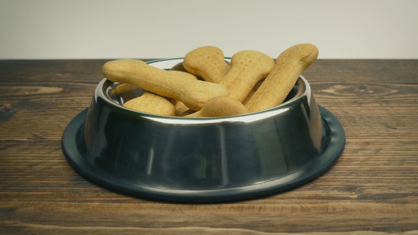 Passing Dog Bowl Full Of Bones alt