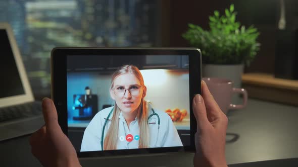 Tablet Screen with Female Doctor Video Calling