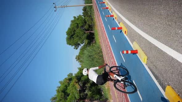 Cycling Man Vertical alt