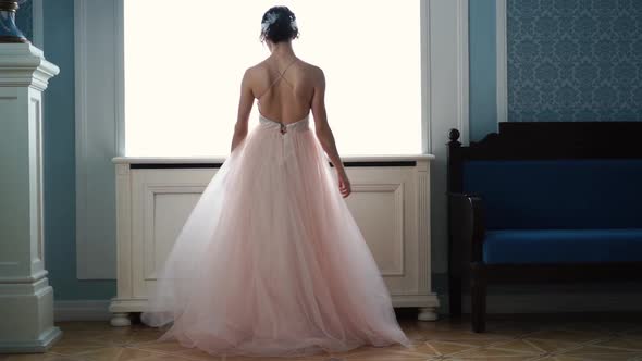 Beautiful Bride Is Spinning in a Wedding Dress
