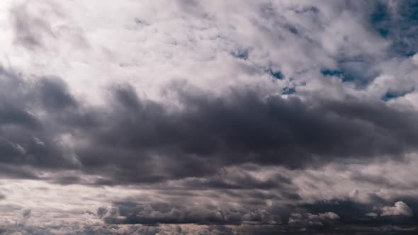 Timelapse of Gray Cumulus Clouds Moves in Blue Dramatic Sky Cirrus Cloud Space alt