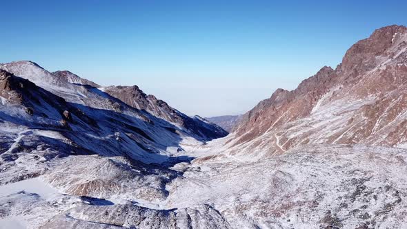 High Rocks Covered with Snow alt