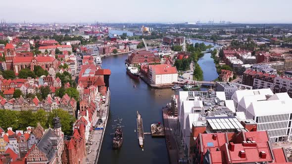 Gdansk Old Town Aerial Shot. Backwards flight over Motlawa River