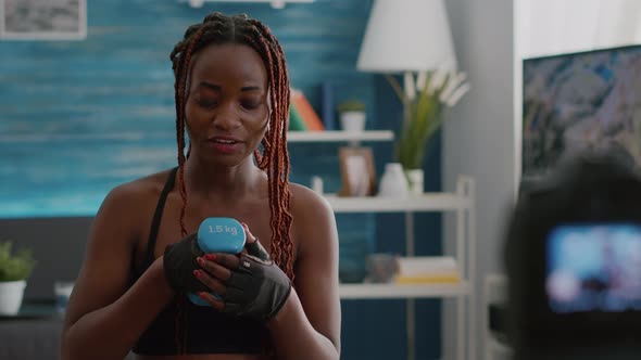 Slim Black Trainer Exercising Body Muscles Recording Morning Yoga Workout alt