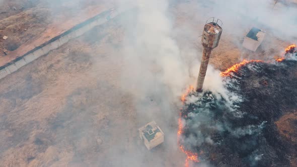 Aerial View of a Natural Disaster - Burning Grass, Air Pollution, Smoke Over a Fire