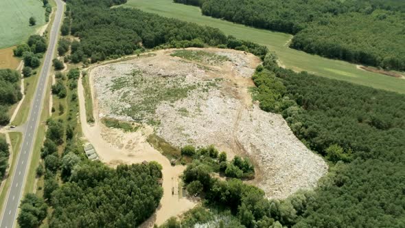 Aerial View of Garbage Dump in Forest with Trash, Rubbish and Litter