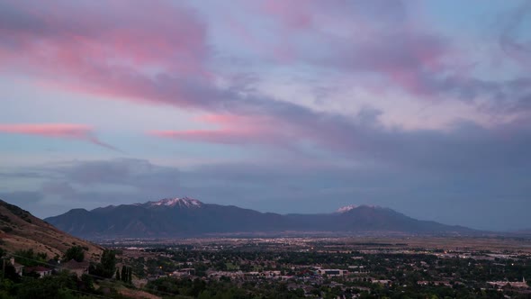 Colorful sunrise time lapse looking over Provo towards Spanish Fork alt