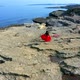 woman dancing on the rock by the sea - VideoHive Item for Sale