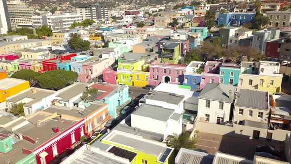 Aerial wide drone shot of Bokaap, Cape Town, South Africa, over Mosque Shafee at Chiapini and Wale S alt