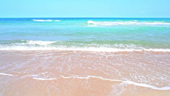 Turquoise Tropical Sea, Waves, Sandy Beach and Endless Hotizon alt