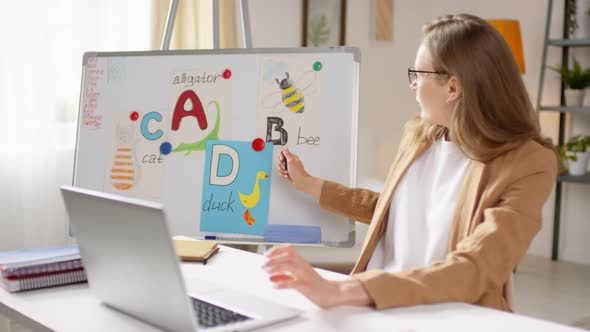 Sequence of Woman Teaching Little Kids Online alt