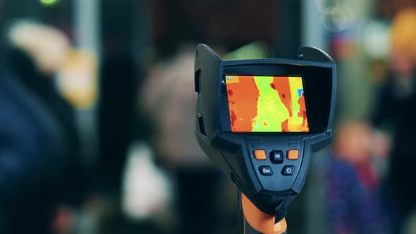 Thermographic Device Is Measuring Temperature Is a Public Place alt
