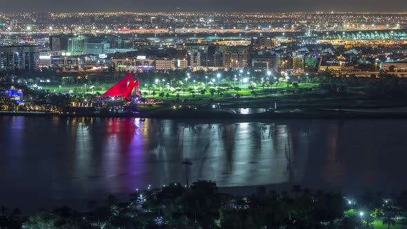View of Lights From Illuminated Modern City Dubai at Night UAE Aerial Timelapse alt