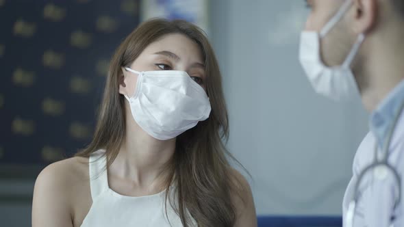 Female patient was talking and checking sickness by physician, examining, treatment, medical health.