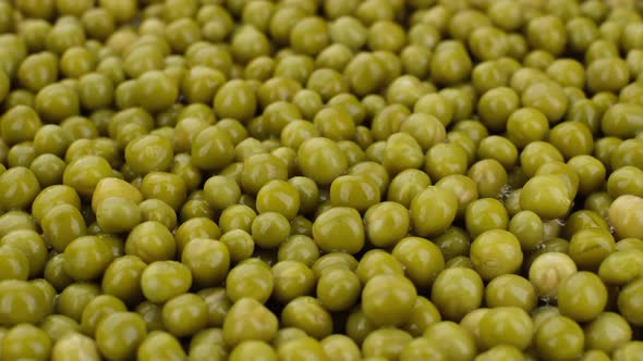 canned green peas top view. ingredient ford Olivier salad alt