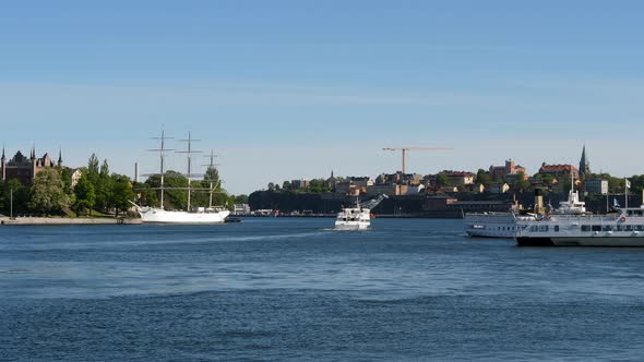 Stockholm, Sweden. Light Waterway Traffic During Covid-19 Virus Outbreak, Docked Ships and Sailing M alt
