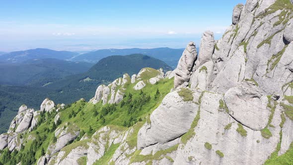 Flying Over High Mountain Ridge in Ciucas Mountains, Romania alt