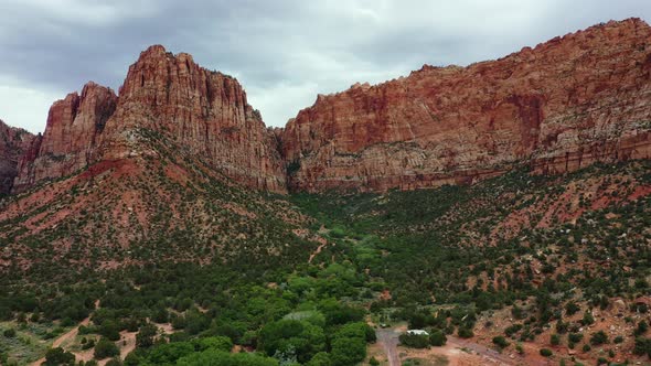 Red Rock Mountains And Vegetation In Sedona, Arizona - aerial drone shot alt