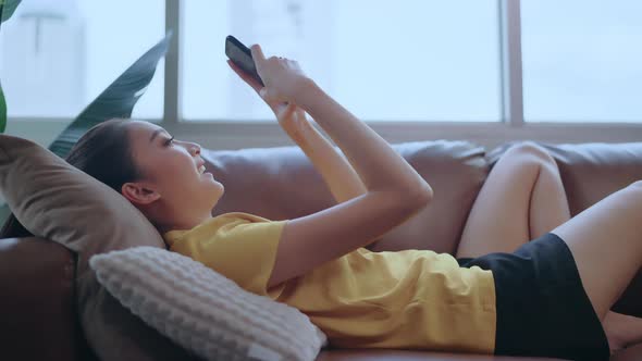 happiness cheerful smiling young adult asian female woman wear yellow cloth alt