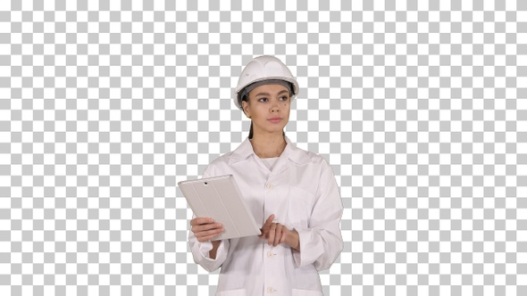 Woman engineer checking information and objects on her alt